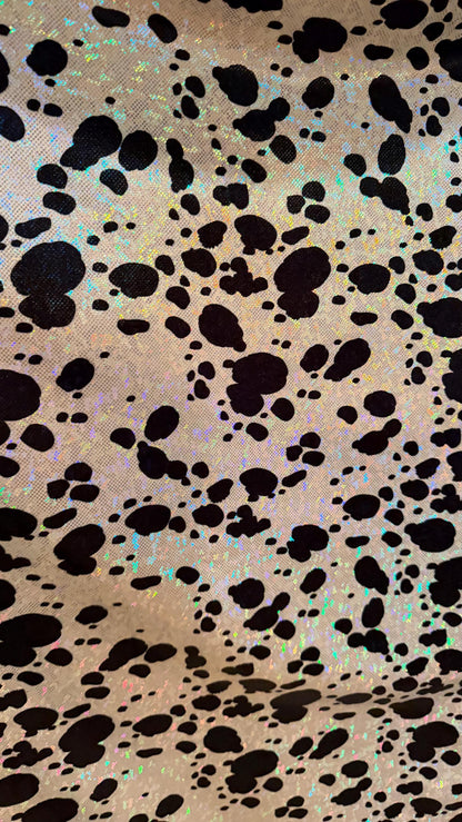 Dalmatian Exotic design w/silver/Black on shattered glass hologram metallic nylon spandex 4-way stretch 58/60” Sold by the YD. High quality