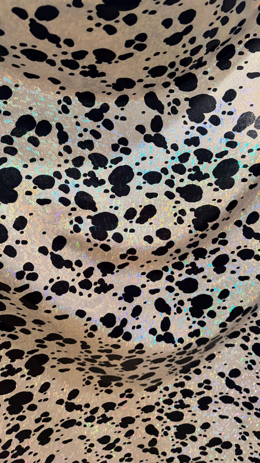 Dalmatian Exotic design w/silver/Black on shattered glass hologram metallic nylon spandex 4-way stretch 58/60” Sold by the YD. High quality