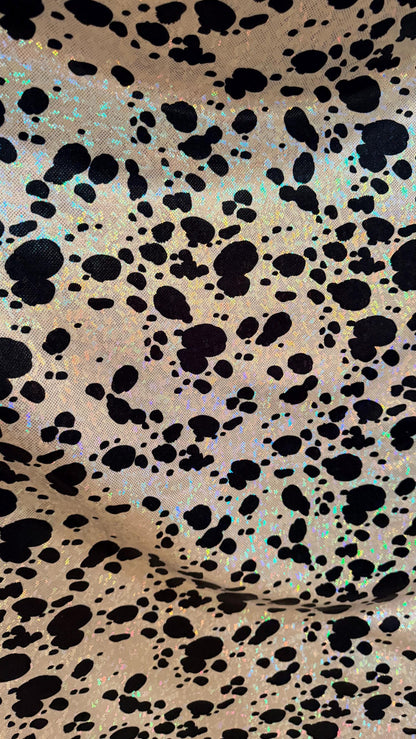 Dalmatian Exotic design w/silver/Black on shattered glass hologram metallic nylon spandex 4-way stretch 58/60” Sold by the YD. High quality