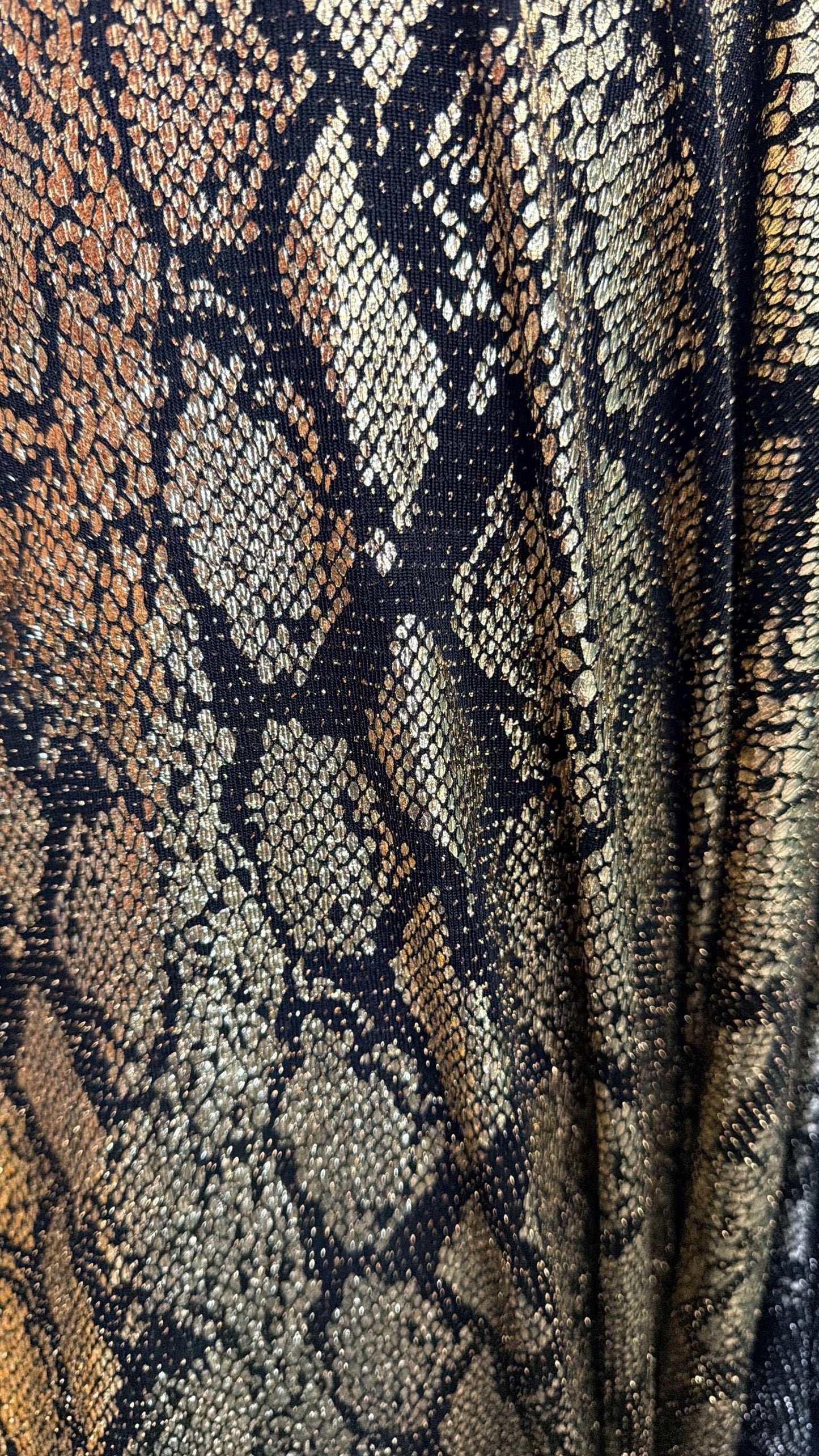 New metallic snake skin design on nylon  spandex base 4 way stretch 58/60" Sold by the YD. ships worldwide from Los Angeles California USA