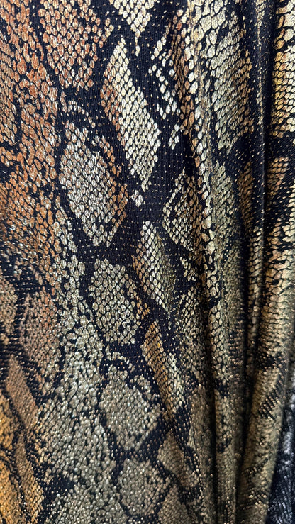 New metallic snake skin design on nylon  spandex base 4 way stretch 58/60" Sold by the YD. ships worldwide from Los Angeles California USA