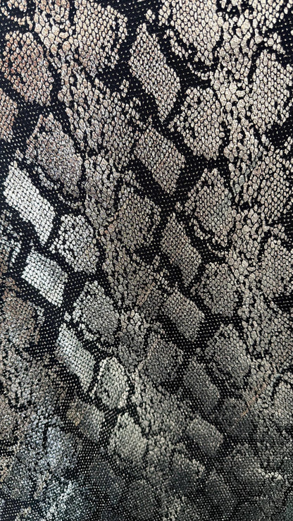 New metallic snake skin design on nylon  spandex base 4 way stretch 58/60" Sold by the YD. ships worldwide from Los Angeles California USA