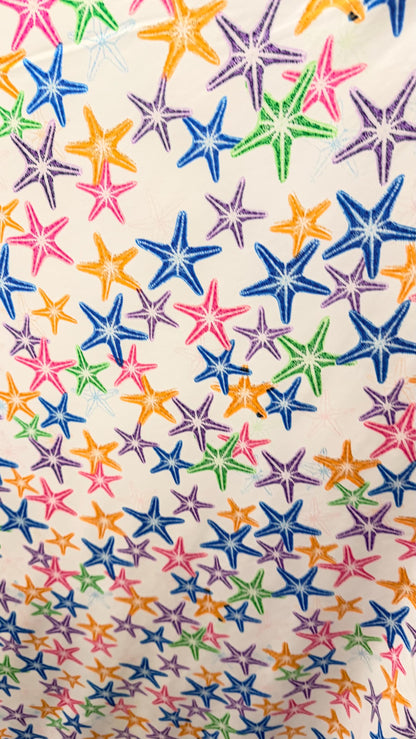 New starfish design Multicolor print on nylon spandex 4-way stretch 58/60” Sold by the YD. Ships worldwide from Los Angeles California USA.