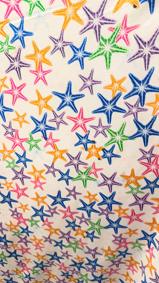 New starfish design Multicolor print on nylon spandex 4-way stretch 58/60” Sold by the YD. Ships worldwide from Los Angeles California USA.