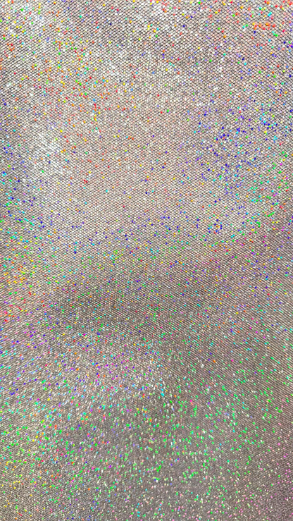 New Twill fabric non stretch with silver holo metallic foil all over 58/60" Sold by the YD. Ships worldwide from Los Angeles California USA.