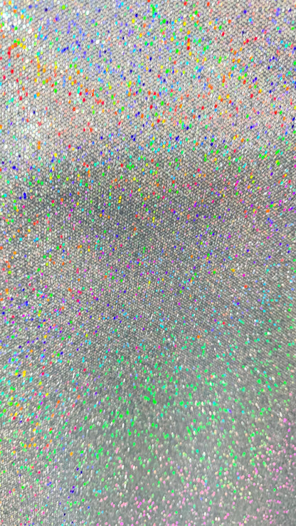 New Twill fabric non stretch with silver holo metallic foil all over 58/60" Sold by the YD. Ships worldwide from Los Angeles California USA.