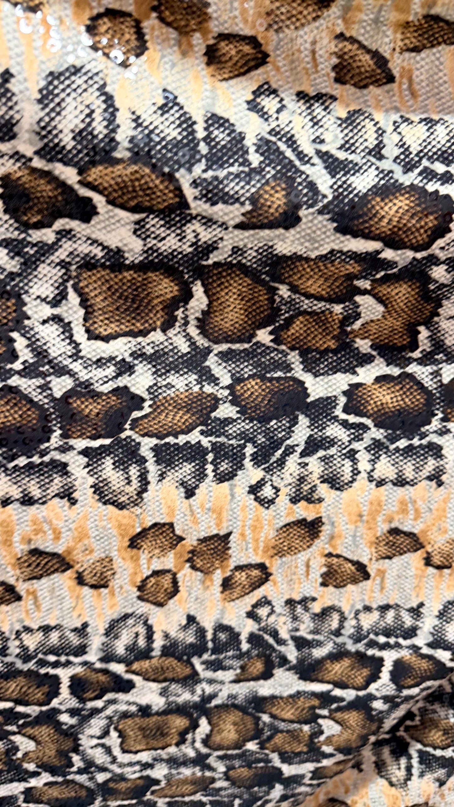 New Skin Snake design print on poly spandex with clear sequins  4-way stretch 58/60” Sold by the YD. Ships worldwide from Los Angeles CA