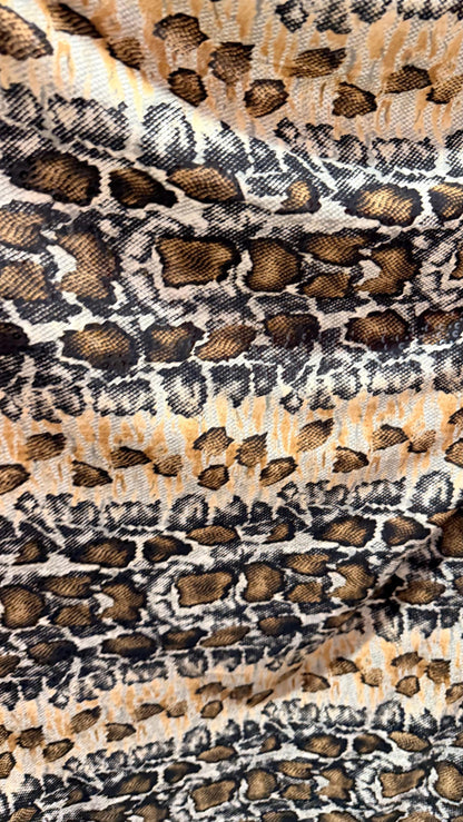 New Skin Snake design print on poly spandex with clear sequins  4-way stretch 58/60” Sold by the YD. Ships worldwide from Los Angeles CA