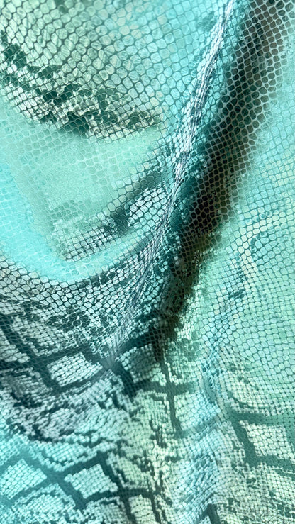 3D Exotic Python snake design forest green color  stretch PU vinyl 2-way stretch 58/60” Sold by the YD.