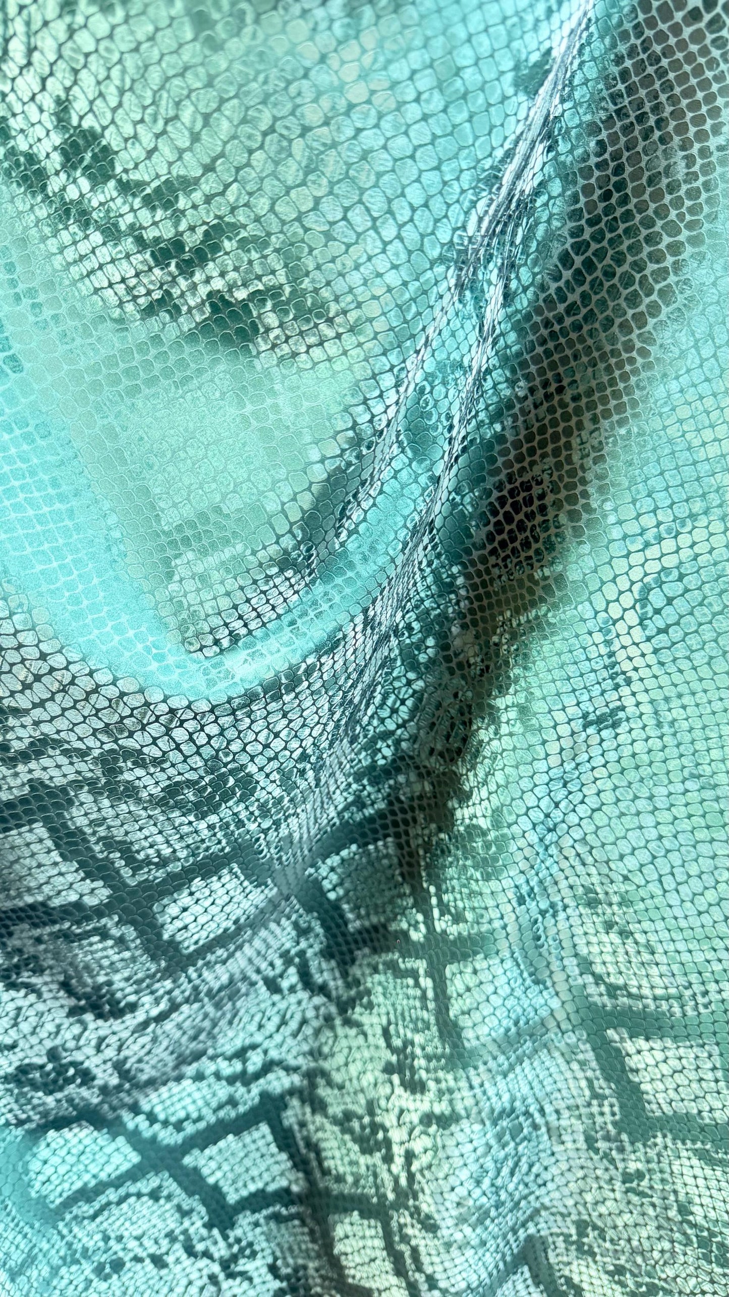 3D Exotic Python snake design forest green color  stretch PU vinyl 2-way stretch 58/60” Sold by the YD.