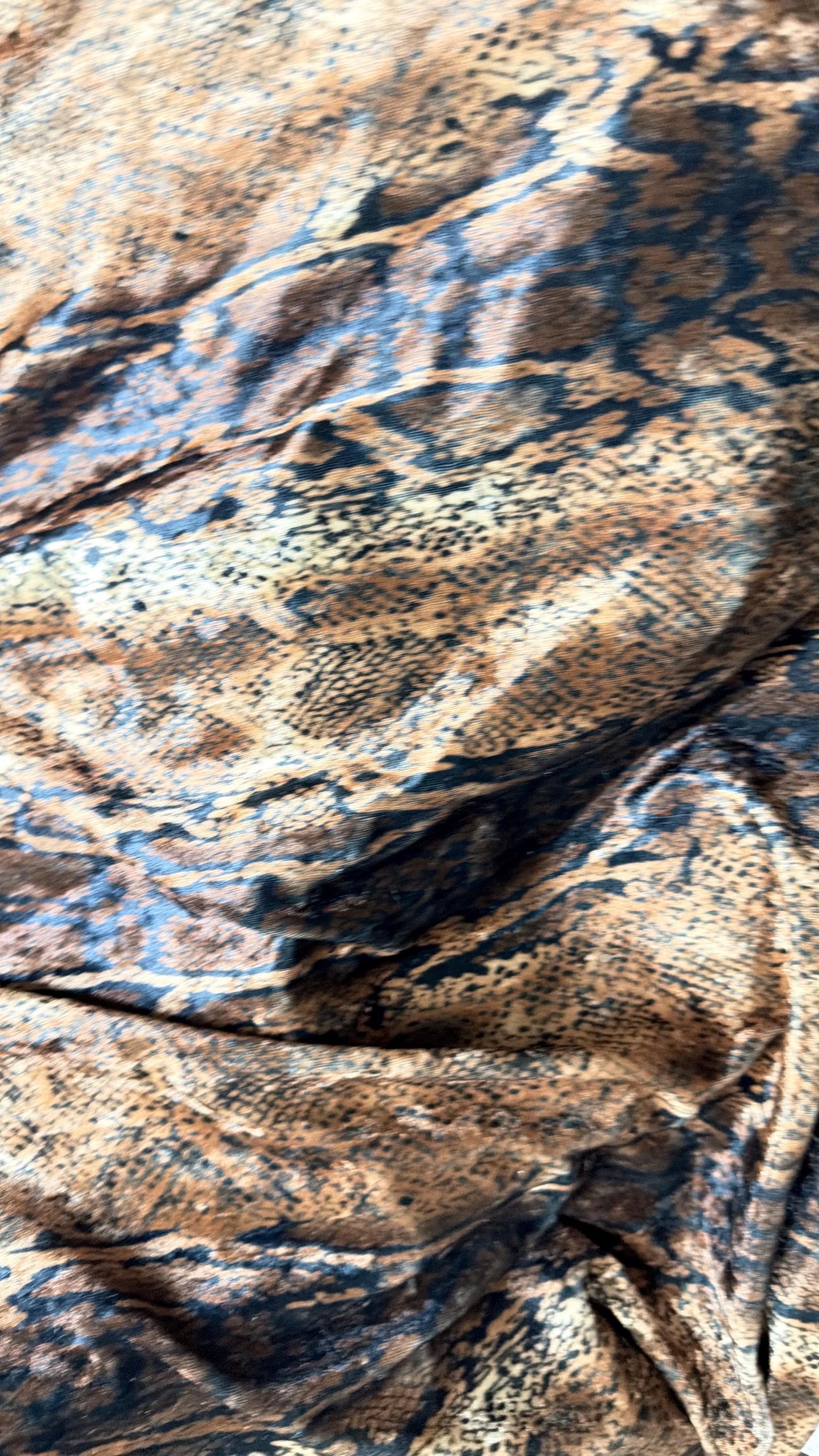 New Exotic Snake design Brown/Gold  print on stretch velvet  4-way Stretch great quality of velvet 58/60” Sold by the YD.