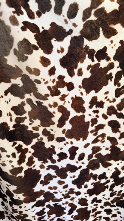 Exotic Cow design print on great quality of stretch velvet 4-way stretch 58/60” Sold by the YD. Ships worldwide from Los Angeles California