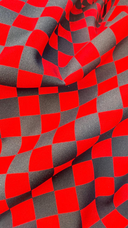 Checkered design 1" Red/Black  print on poly spandex 4way stretch 58/60" Sold by the YD. Ships worldwide from Los Angeles California USA