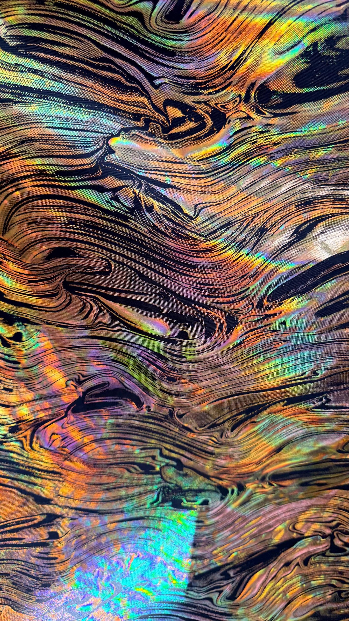 New Abstract design Iridescent metallic poly spandex 4way stretch 58/60" Sold by the YD. Ships worldwide from Los Angeles California USA.
