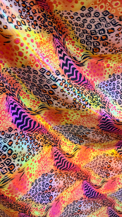 New Safari design multicolor Iridescent metallic nylon spandex 4way stretch 58/60" Sold by the yd. Ships worldwide from Los Angeles Californ
