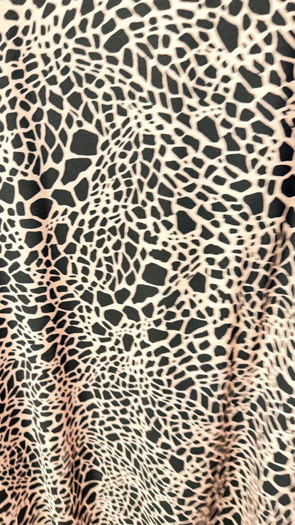 New Giraffe Abstrat design print on nylon spandex 4-way stretch 58/60” Sold by the YD. Ships worldwide from Los Angeles California USA.
