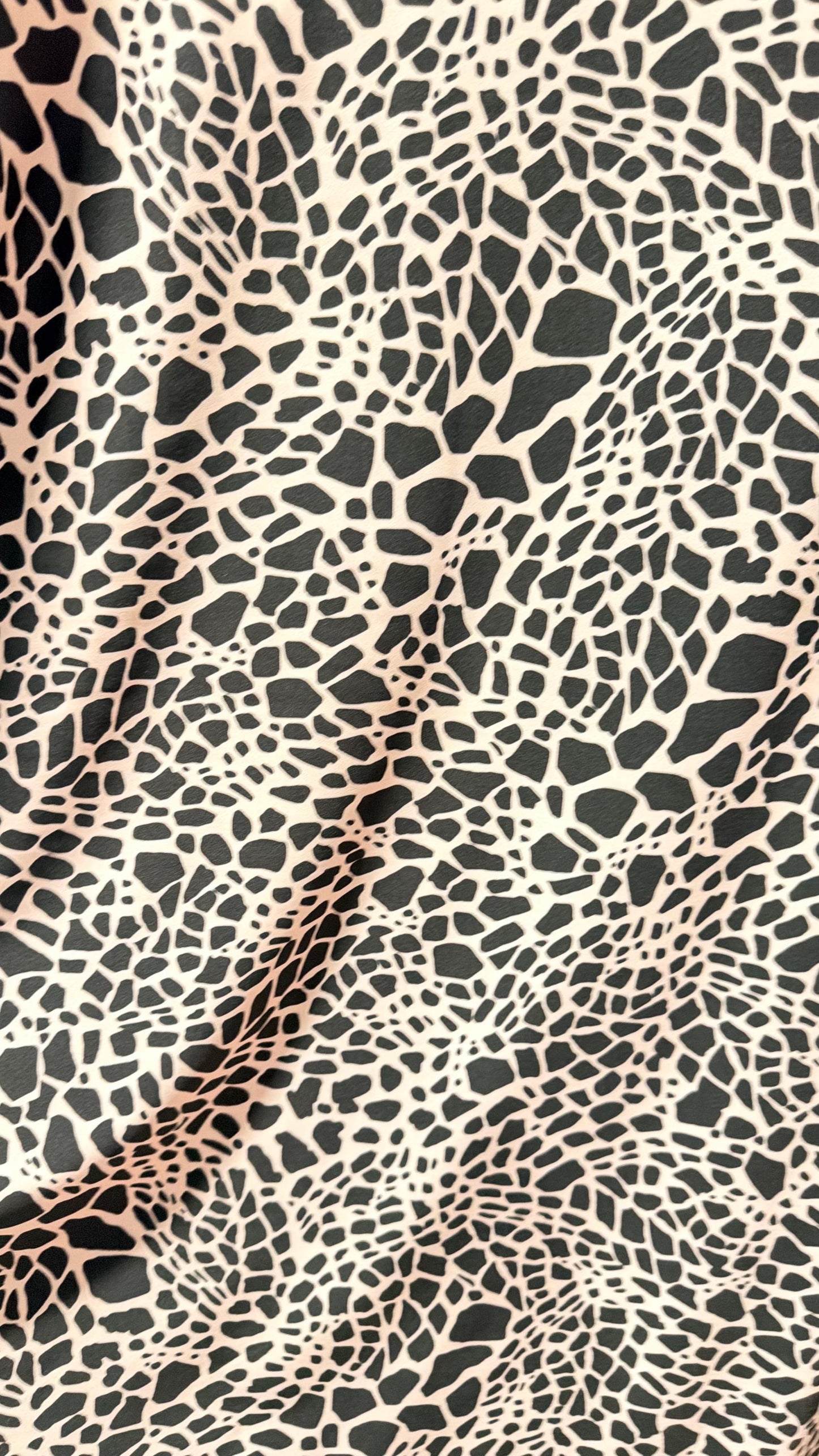 New Giraffe Abstrat design print on nylon spandex 4-way stretch 58/60” Sold by the YD. Ships worldwide from Los Angeles California USA.