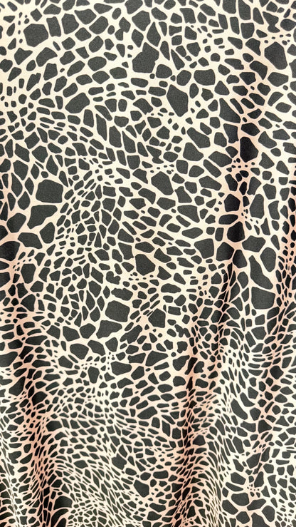 New Giraffe Abstrat design print on nylon spandex 4-way stretch 58/60” Sold by the YD. Ships worldwide from Los Angeles California USA.