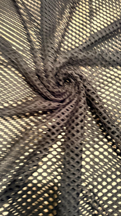 Fishnet Diamond mesh poly spandex 2-way stretch 58/60" Sold by the YD. Ships worldwide from Los Angeles California USA.