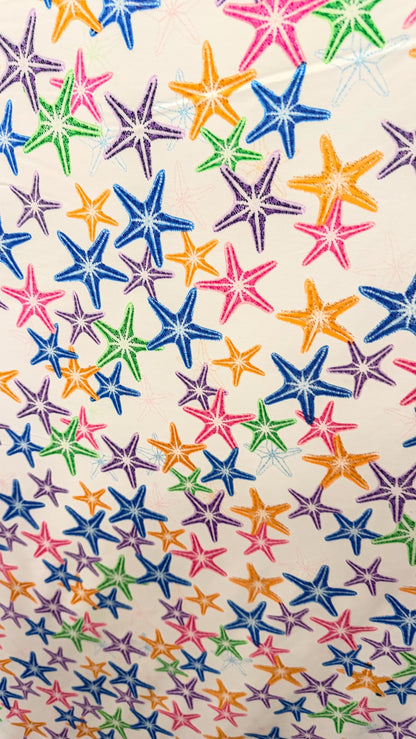 New starfish design Multicolor print on nylon spandex 4-way stretch 58/60” Sold by the YD. Ships worldwide from Los Angeles California USA.