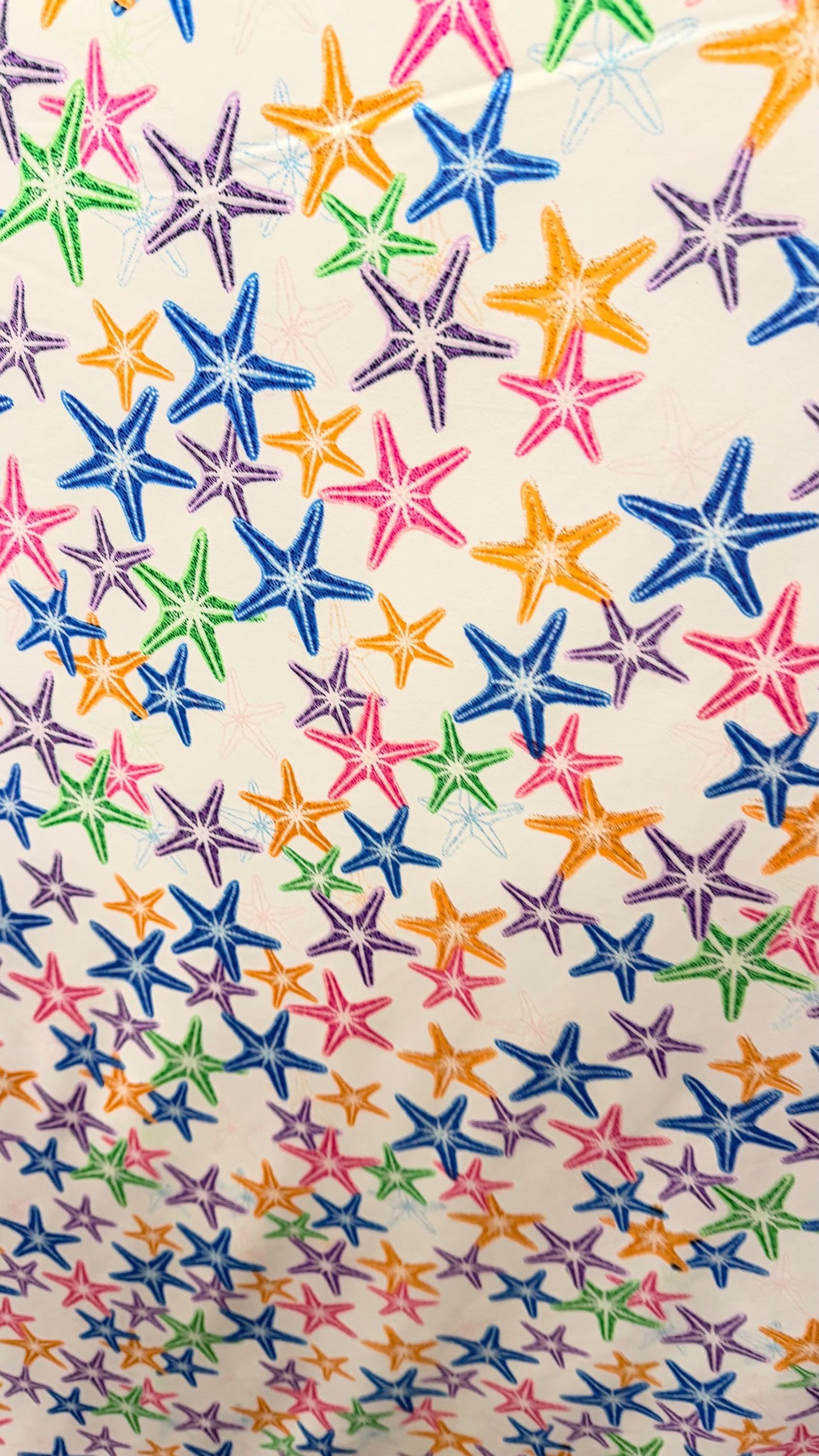 New starfish design Multicolor print on nylon spandex 4-way stretch 58/60” Sold by the YD. Ships worldwide from Los Angeles California USA.