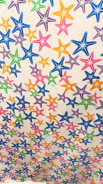 New starfish design Multicolor print on nylon spandex 4-way stretch 58/60” Sold by the YD. Ships worldwide from Los Angeles California USA.