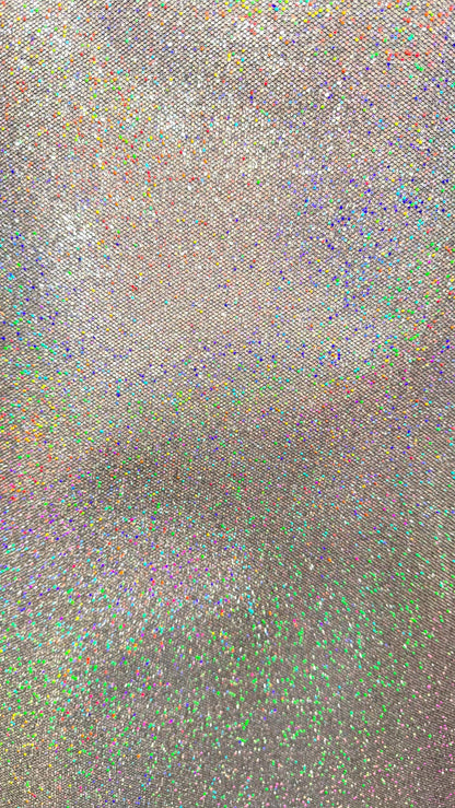 New Twill fabric non stretch with silver holo metallic foil all over 58/60" Sold by the YD. Ships worldwide from Los Angeles California USA.