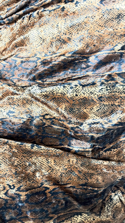 New Exotic Snake design Brown/Gold  print on stretch velvet  4-way Stretch great quality of velvet 58/60” Sold by the YD.