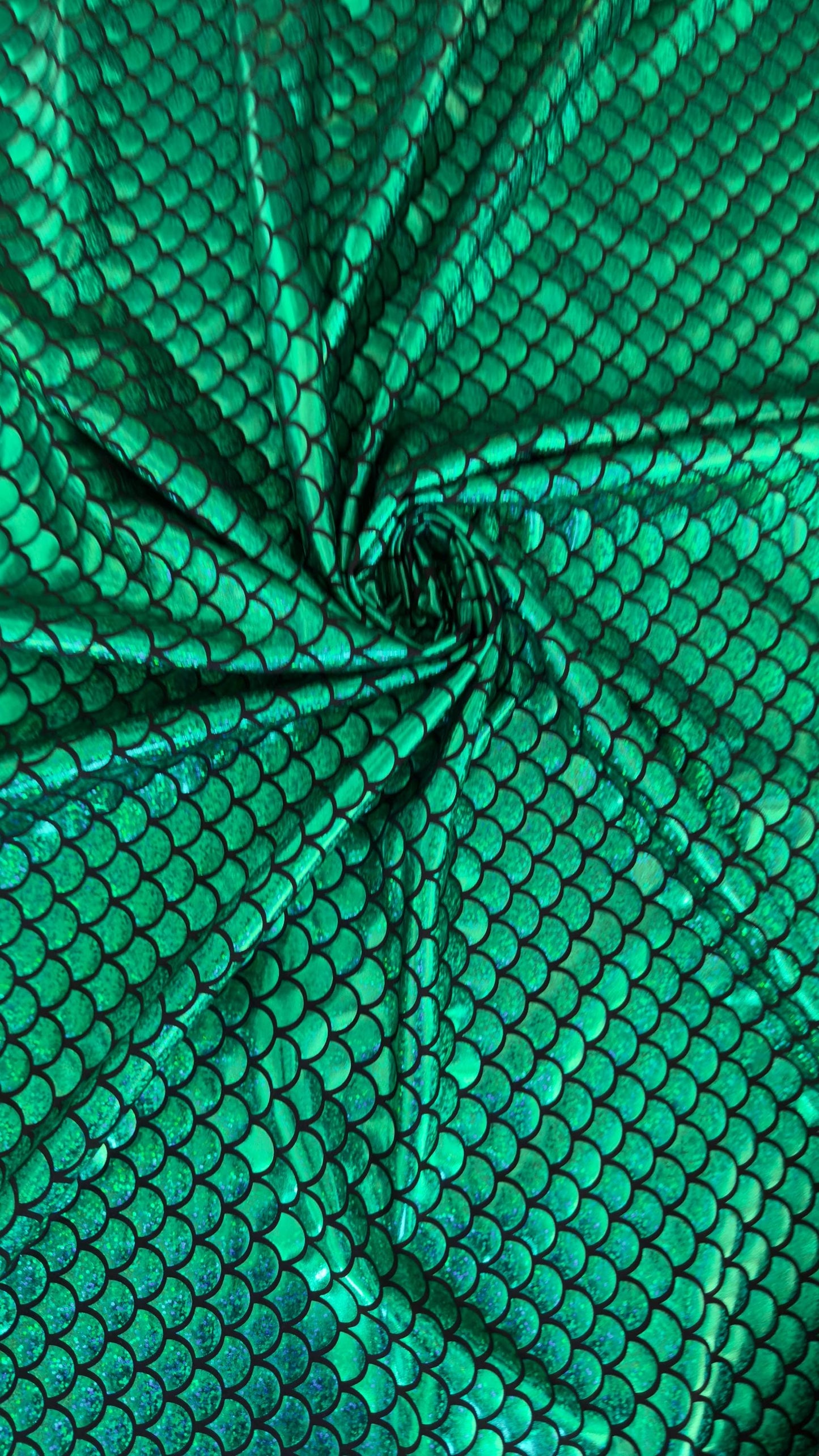 New Mermaid design Medium size hologram metallic nylon spandex 4-way stretch 58/60” Sold by the YD. Ships worldwide from Los Angeles CA USA.