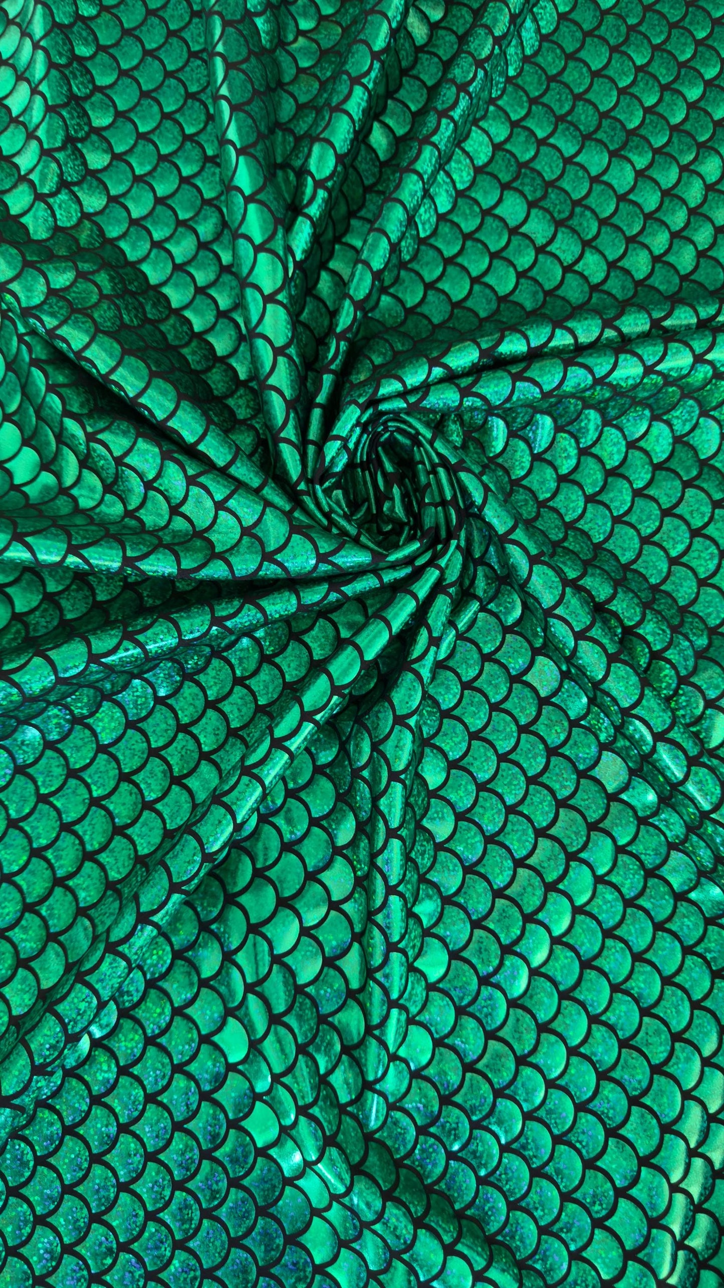 New Mermaid design Medium size hologram metallic nylon spandex 4-way stretch 58/60” Sold by the YD. Ships worldwide from Los Angeles CA USA.