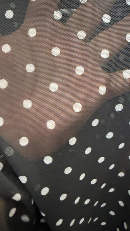 New polka dots design print on power mesh 4-way stretch Black/white 58/60” Sold by the YD. Ships worldwide from Los Angeles California USA.