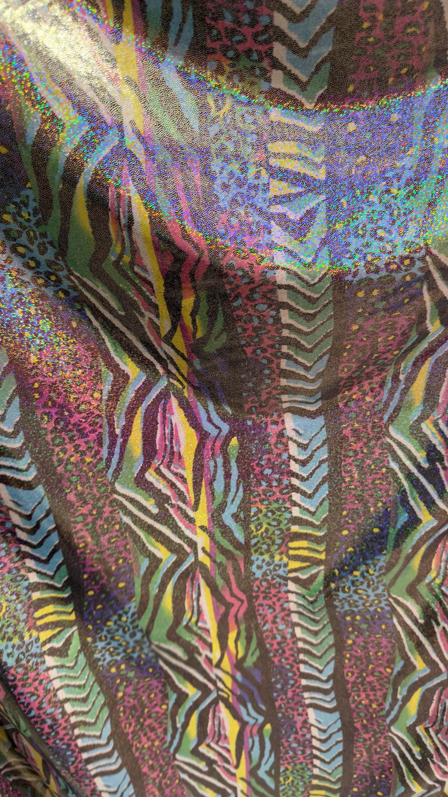 New Safari design multicolor Hologram metallic nylon spandex with foggy foil  4way stretch 58/60" Sold by the yd. Ships worldwide
