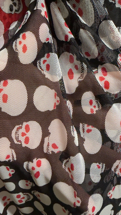 New Terminator skull desin on power mesh nylon spandex 4 way stretch 58/60" Sold by the YD. Ships worldwide from Los Angeles California USA.