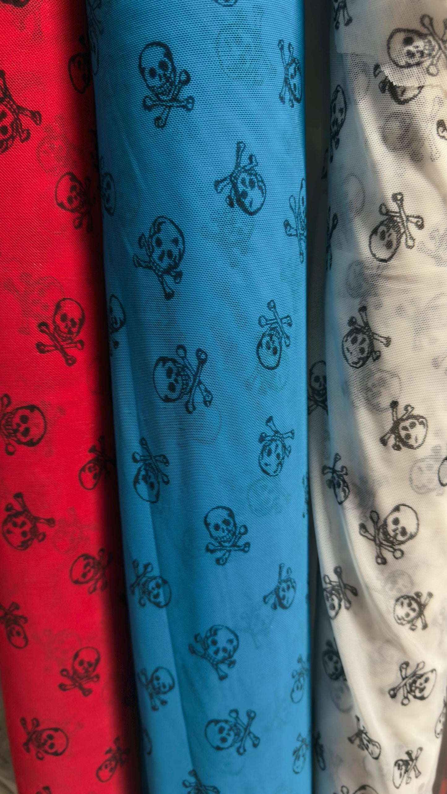 New power mesh skull desin nylon spandex  4 way stretch 58/60" Sold by the YD. Ships worldwide from Los Angeles California USA.