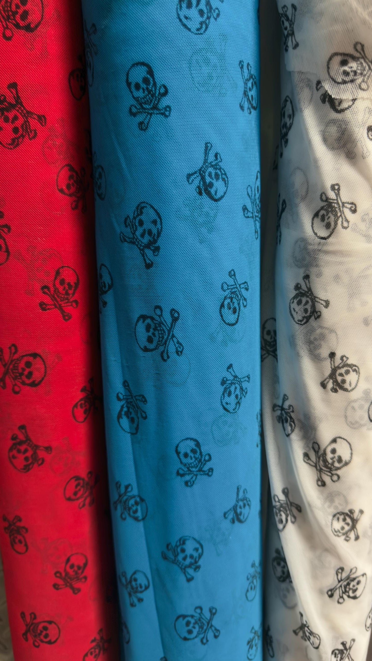 New power mesh skull desin nylon spandex  4 way stretch 58/60" Sold by the YD. Ships worldwide from Los Angeles California USA.