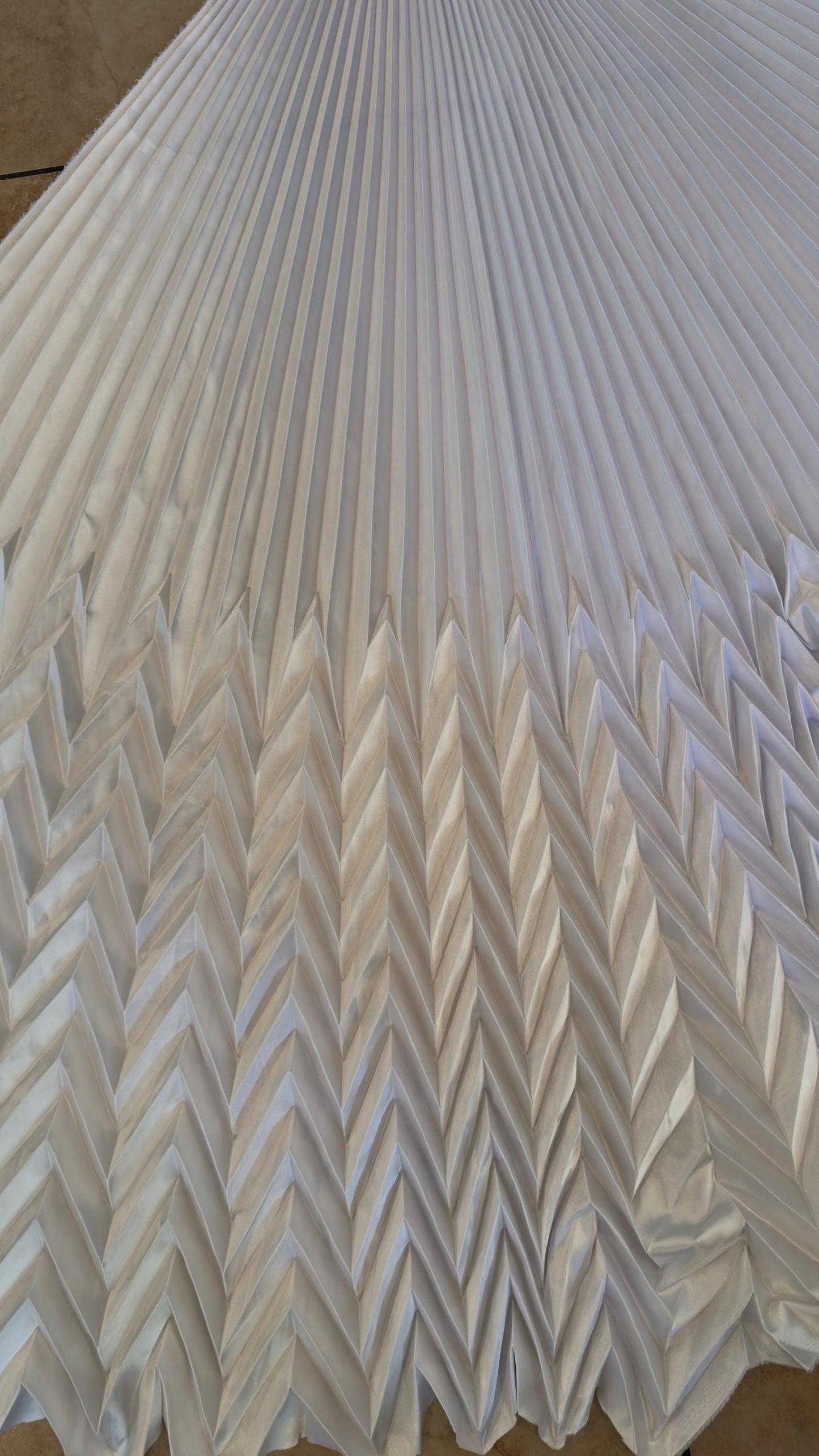 Sunburst pleated Chevron design Super Shiny Silky Satin  stretch 180” length by 60” width Sold by the PC. Ships worldwide from Los Angeles