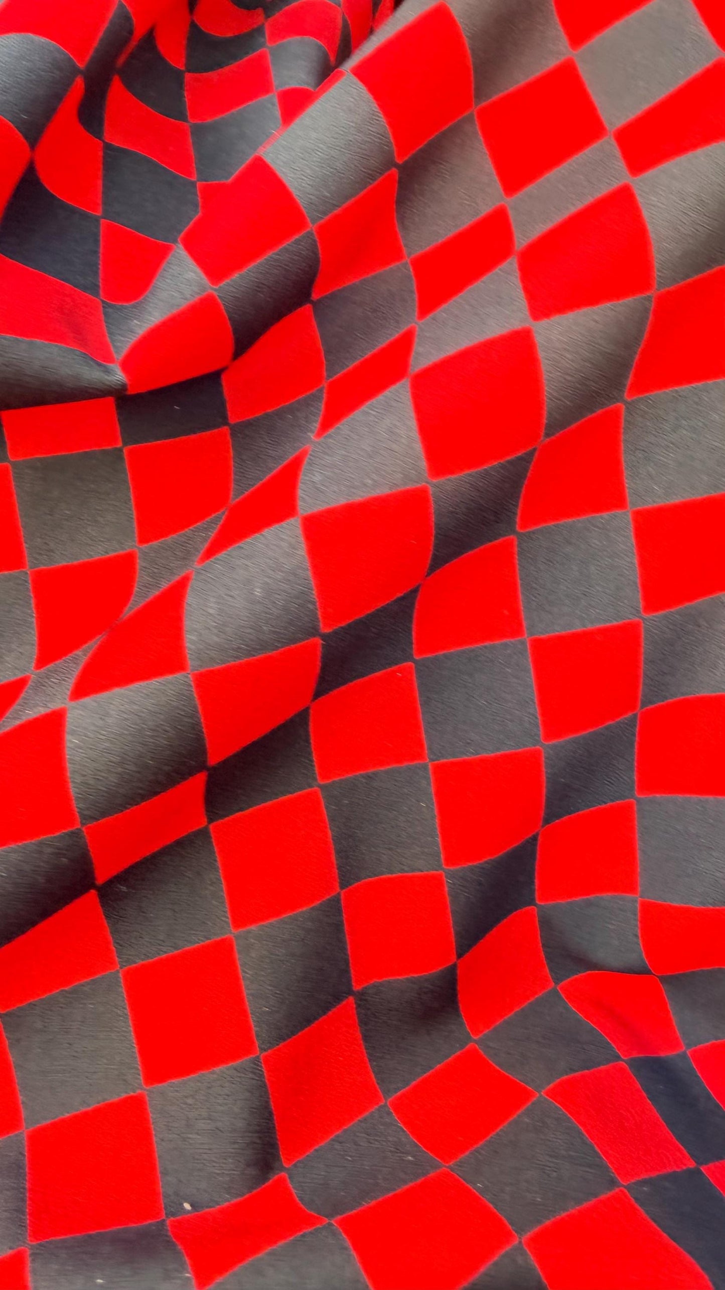 Checkered design 1" Red/Black  print on poly spandex 4way stretch 58/60" Sold by the YD. Ships worldwide from Los Angeles California USA