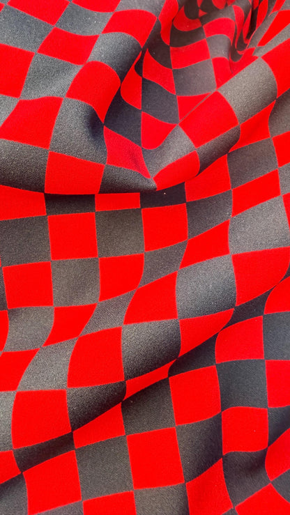Checkered design 1" Red/Black  print on poly spandex 4way stretch 58/60" Sold by the YD. Ships worldwide from Los Angeles California USA