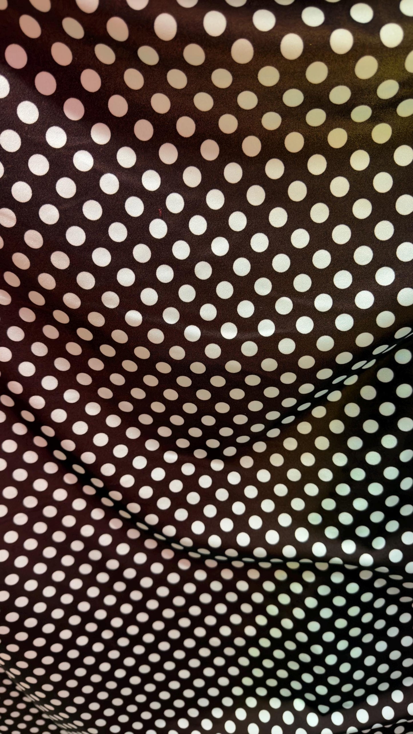 New polka dots design Blue/black on great quality of nylon spandex 4-way stretch 58/60” Sold by the YD. Ships worldwide from Los Angeles CA