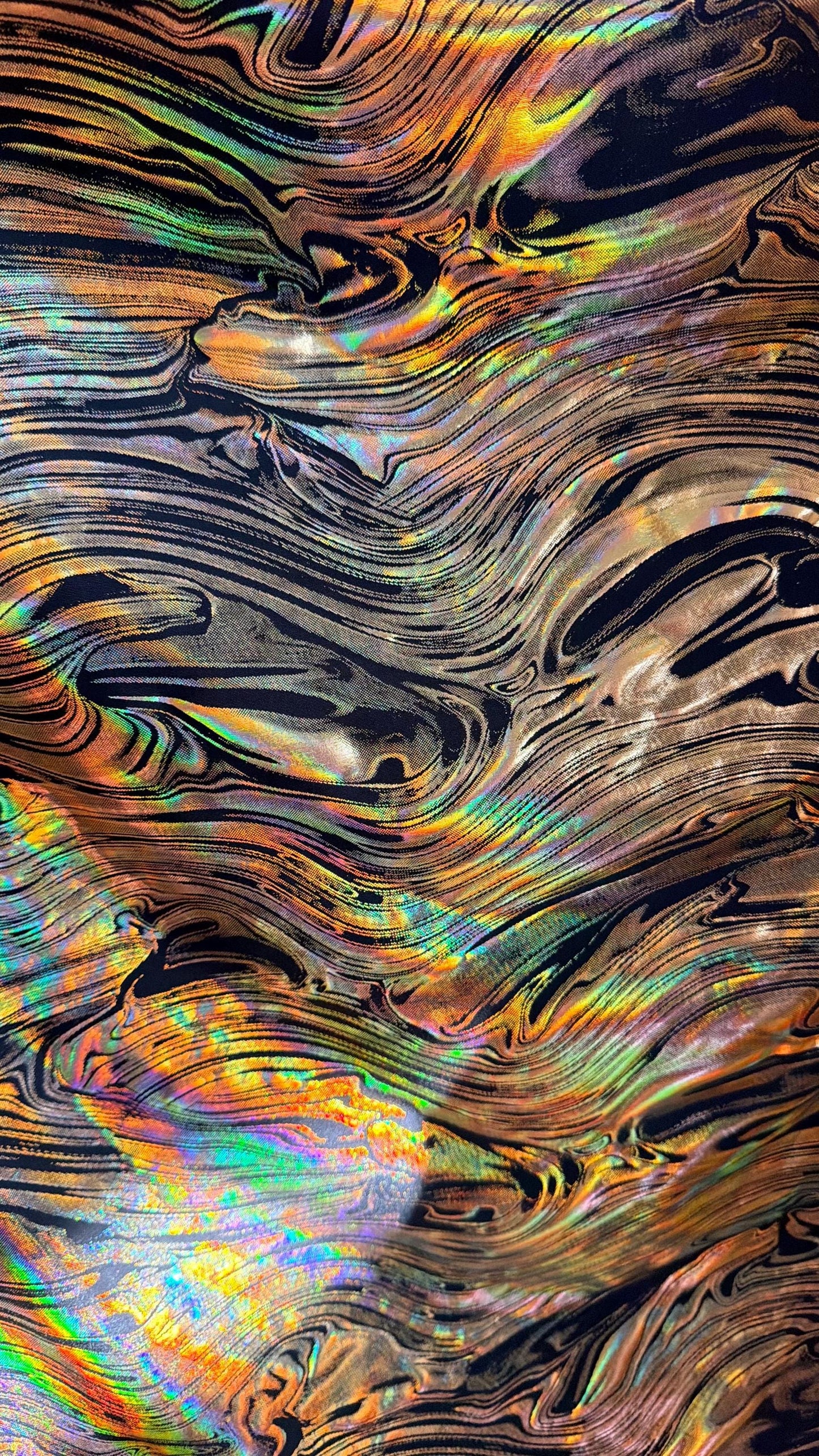 New Abstract design Iridescent metallic poly spandex 4way stretch 58/60" Sold by the YD. Ships worldwide from Los Angeles California USA.