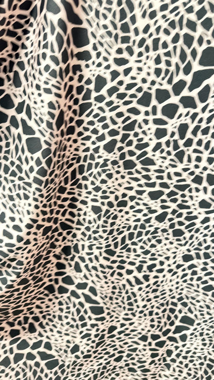 New Giraffe Abstrat design print on nylon spandex 4-way stretch 58/60” Sold by the YD. Ships worldwide from Los Angeles California USA.