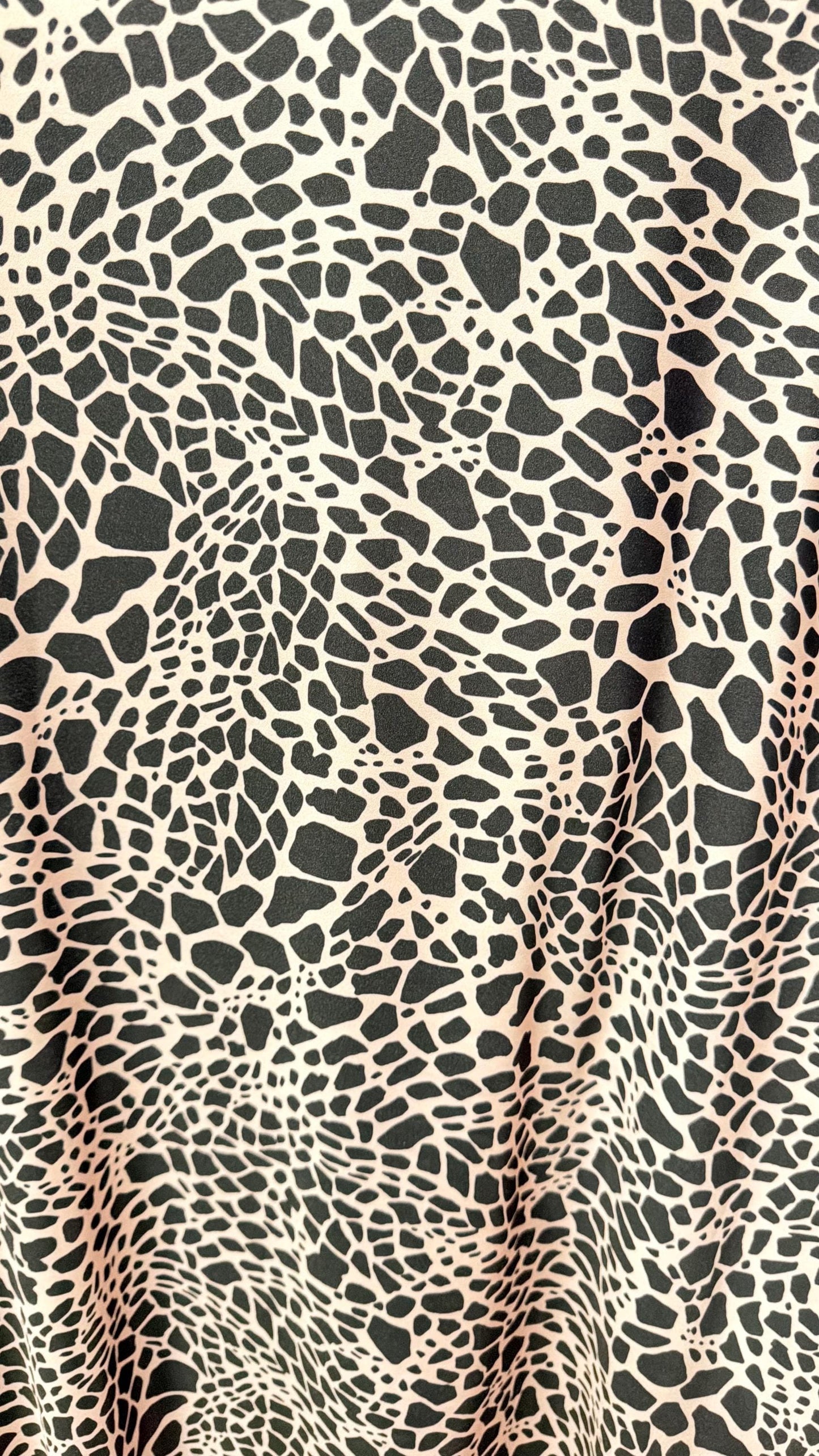 New Giraffe Abstrat design print on nylon spandex 4-way stretch 58/60” Sold by the YD. Ships worldwide from Los Angeles California USA.