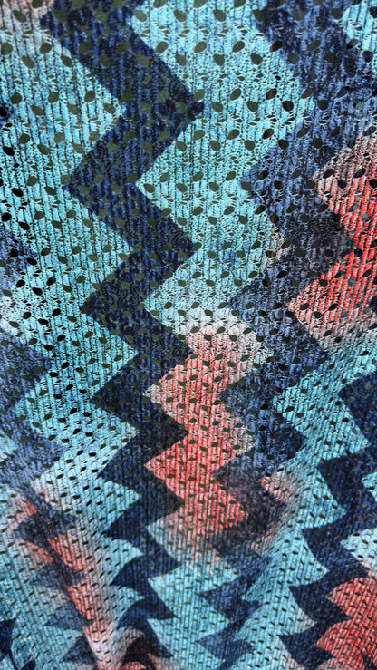 New lace crochet design Blue/multicolor 2-way stretch 54/55” Sold by the YD. Ships worldwide from Los Angeles California USA