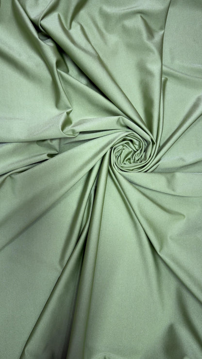 Great quality shiny Kiwi nylon spandex 4-way stretch 58/60” Sold by the YD. Ships worldwide from Los Ángeles California USA.