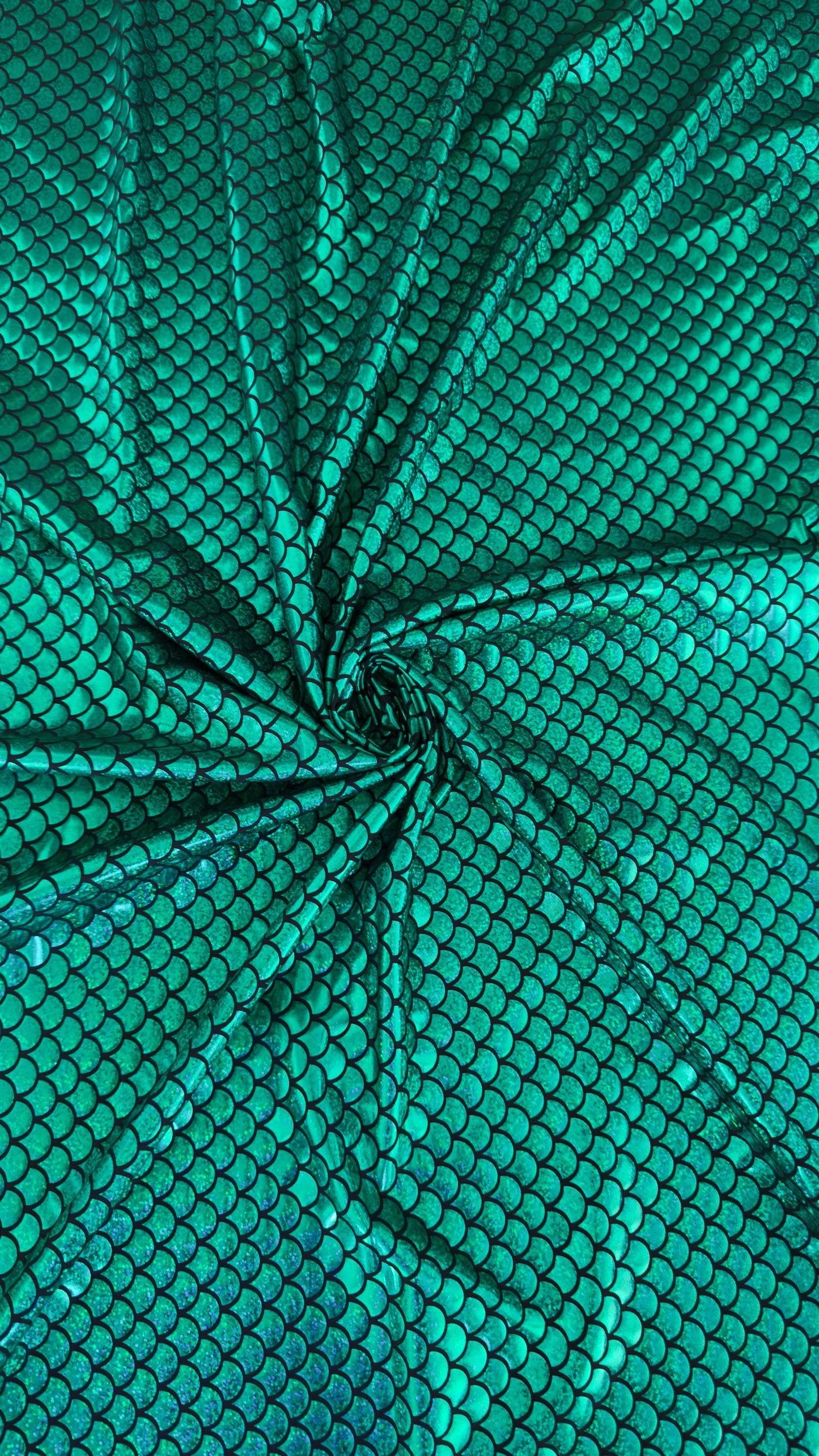 New Mermaid design Medium size hologram metallic nylon spandex 4-way stretch 58/60” Sold by the YD. Ships worldwide from Los Angeles CA USA.