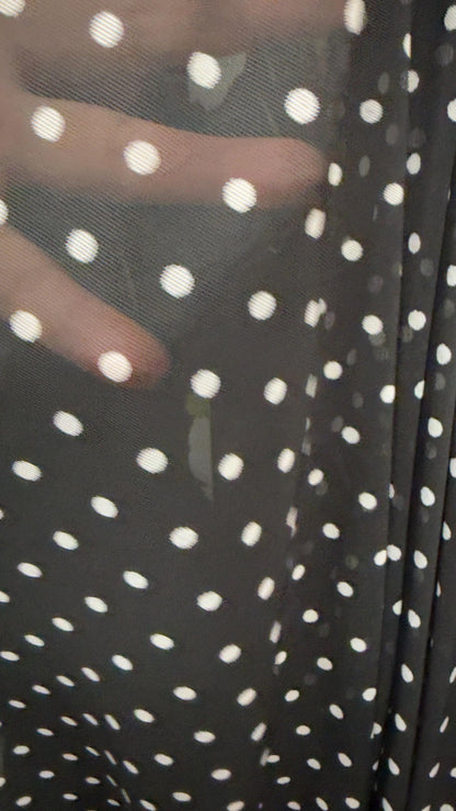 New polka dots design print on power mesh 4-way stretch Black/white 58/60” Sold by the YD. Ships worldwide from Los Angeles California USA.
