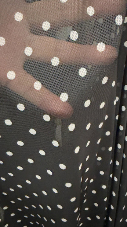 New polka dots design print on power mesh 4-way stretch Black/white 58/60” Sold by the YD. Ships worldwide from Los Angeles California USA.