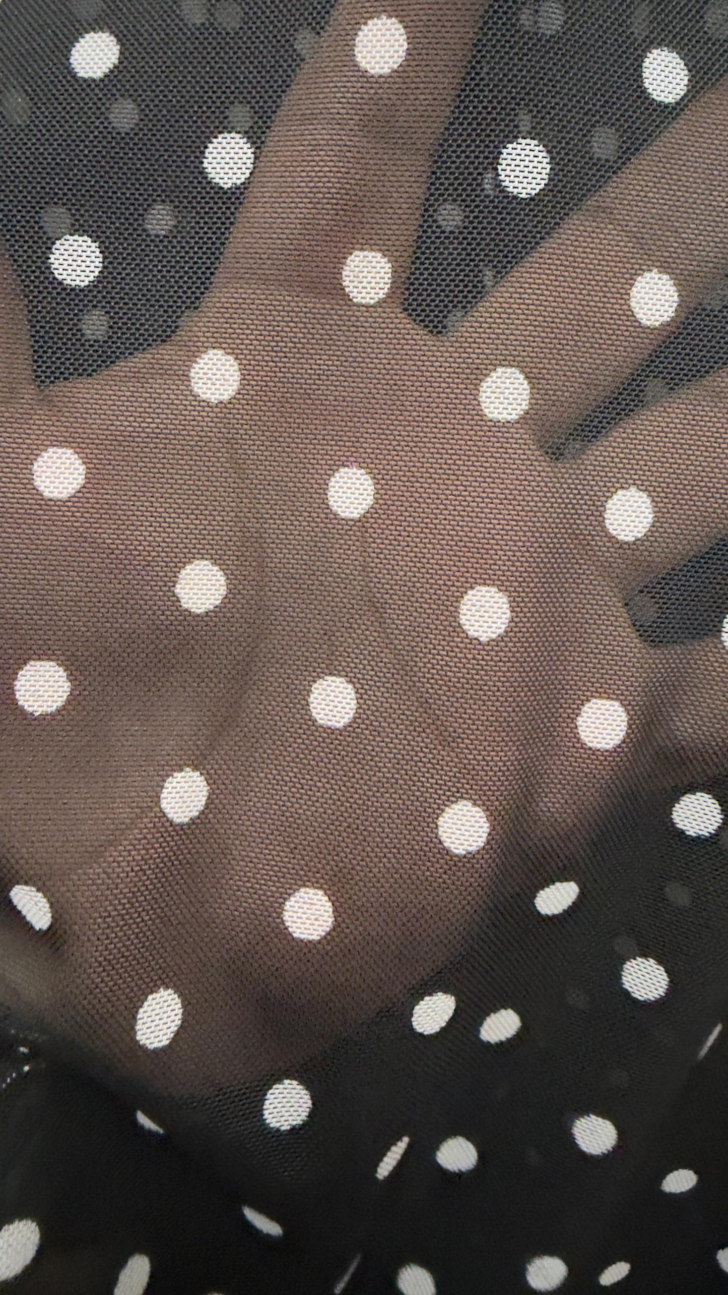 New polka dots design print on power mesh 4-way stretch Black/white 58/60” Sold by the YD. Ships worldwide from Los Angeles California USA.