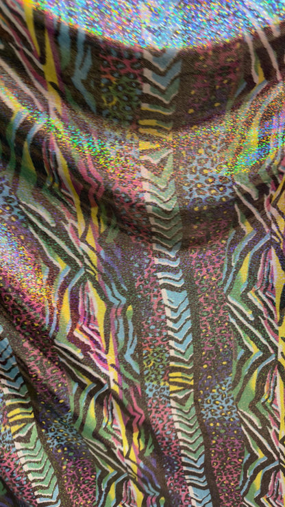 New Safari design multicolor Hologram metallic nylon spandex with foggy foil  4way stretch 58/60" Sold by the yd. Ships worldwide
