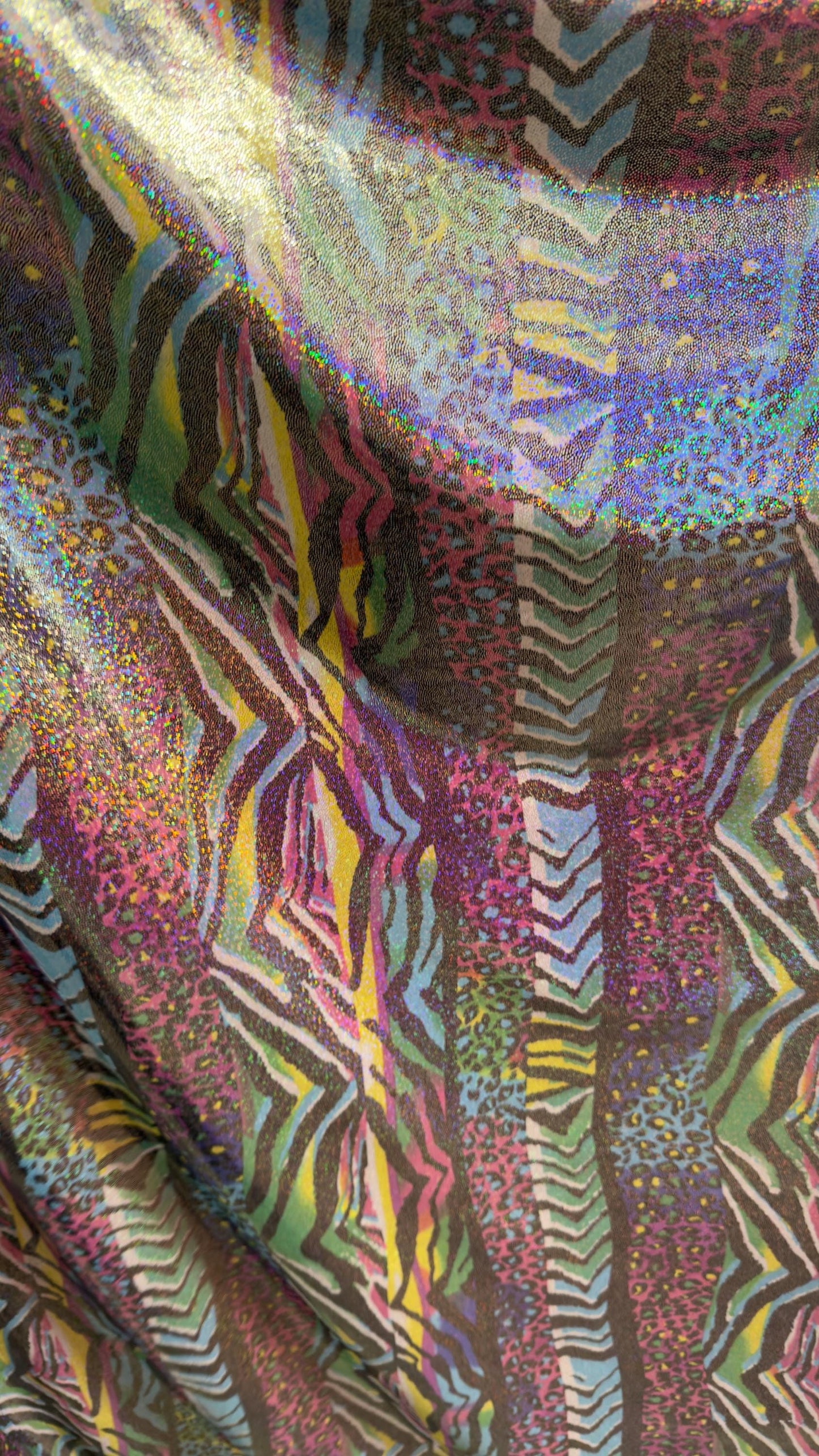 New Safari design multicolor Hologram metallic nylon spandex with foggy foil  4way stretch 58/60" Sold by the yd. Ships worldwide